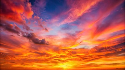 Fototapeta premium A vibrant orange and pink sunset paints the evening sky with an array of pastel shades, colorful sunset, sunset colors, soft colors