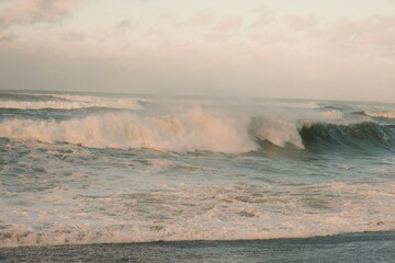 Rough Ocean Waves in Afternoon Light: Powerful Coastal Scene