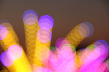 Many line of soft colorful blurry bokeh light on dark background in Christmas and New Year festival day, can use for background