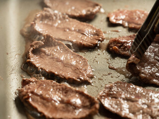 Grilling steak on a griddle