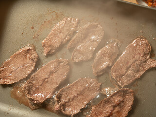 Grilling steak on a griddle