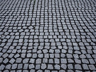 Fototapeta premium Variety of road textures including asphalt, concrete, gravel, and cobblestone, weathered, roads