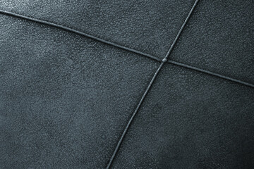 Fototapeta premium Close-up of the alcantara leather texture blue color.