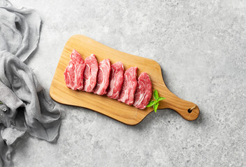 fresh raw meat on cutting board