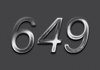 Chrome metal 3D number design of 649 on grey background.