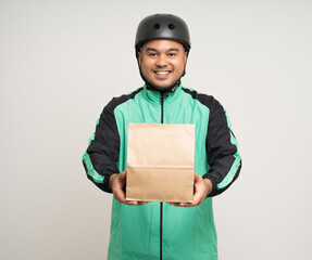 Young asian rider wearing green jacket uniform and bike helmet various action holding food paper...