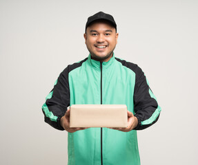 Young asian rider wearing green jacket uniform various action holding paper parcel box delivery to customer. Delivery man service worker Courier and shipping parcel cardboard service.