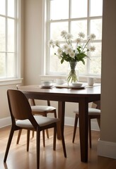 A cozy dining room with a wooden table and chairs, a vase of white flowers, and a framed artwork on the wall.