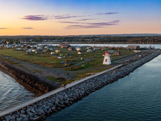 Obraz premium Phare de la pointe Bonaventure lighthouse and campground at sunset, Bonaventure, Quebec, Canada.