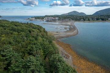 Tourists walking on the Bar Island Trail, Bar Harbor, Maine, United States.