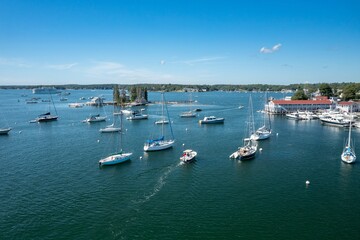 Fototapeta premium Boats moored in the Camden Harbor, Camden, Maine, United States.