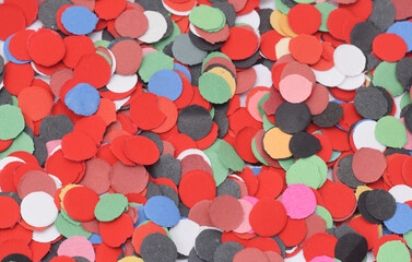 Carnival background with colorful paper confetti closed up background