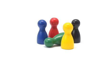 Playing colorful small wooden figures closed up isolated on white. Concept image of equality in teamwork.