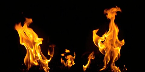 Fiery flames burning brightly against a dark black backdrop, dark, power
