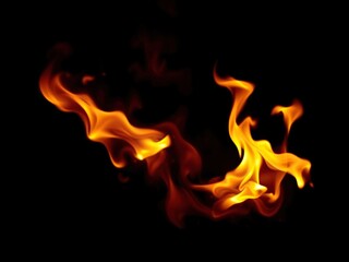 Fiery flames dancing against a dark backdrop, flames, fiery glow