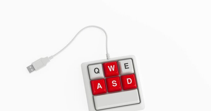 4k Resolution Video: Small, Compact and Designed Specifically for Gaming White Keyboard with Red WASD Keys and a USB Cable Seamless Loop Rotating on a Yellow Background with Alpha Mate