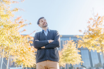 Happy Professional Man Outdoors in Urban Corporate Setting