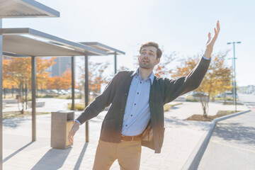 Sad and Anxious Man Waiting Alone at Outdoor Station