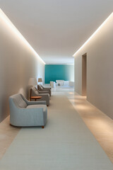 Modern hallway with comfortable chairs and a relaxing atmosphere in a contemporary setting