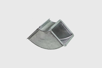 Curved galvanized metal ventilation duct elbow for air distribution systems in industrial and commercial settings.