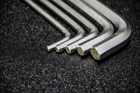 Allen Wrench on Black Background. L key isolated on black, tools, repair shop