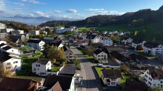 Scenic aerial view of Wald village in Switzerland surrounded by mountains on a sunny day