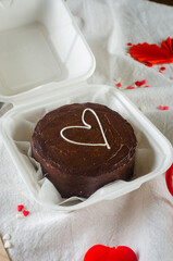 Korean style shocolate bento cake on light background.  Cake for Valentine's Day, Mother's Day, or Birthday,