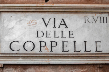 Street sign "Via delle Coppelle" in Rome, Italy
