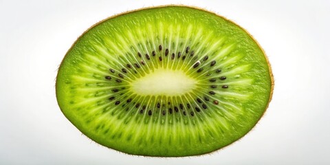 Fototapeta premium A close-up image of a fresh kiwi slice, showcasing the intricate details of its green flesh and numerous black seeds.