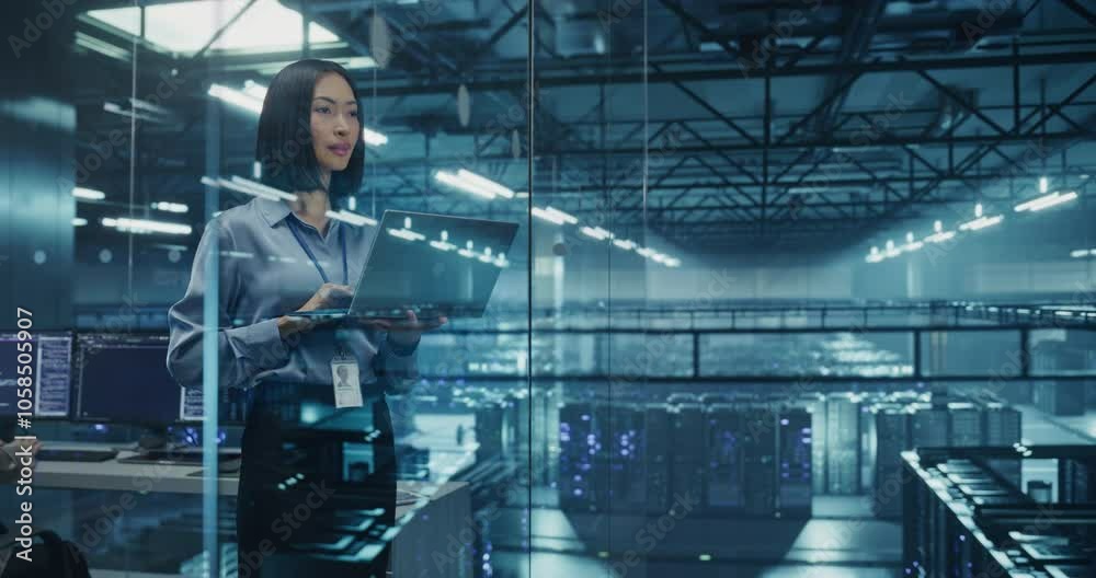 Aufkleber Asian Female DevOps Engineer Monitoring Automation Scripts on Her Laptop Computer, Streamlining Processes of the Data Center IT Infrastructure. Software Specialist Working in Data Protection Field