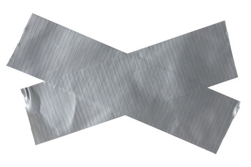 Isolated cross made from torn strip of repair tape with copy space on white background