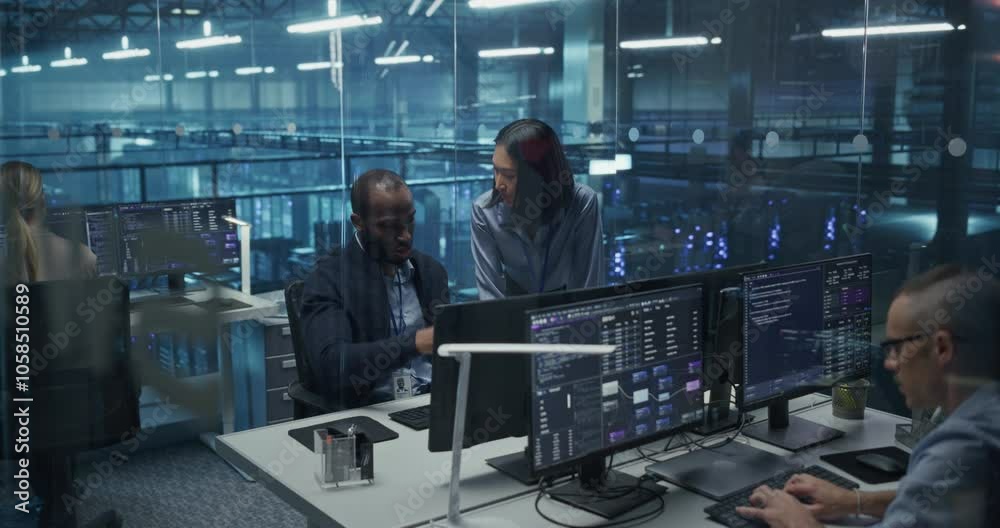 Poster Modern Office in a Server Facility: Asian Female Data Scientist and Black Male Cybersecurity Expert Analyze Data Together on a Desktop Computer, Brainstorming New Security Solutions and Services