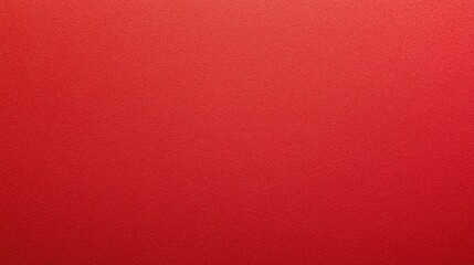Fototapeta premium Cropped red paper background offers a contemporary and minimal aesthetic. This abstract texture creates a vibrant paper concept with ample copy space for your creative needs.