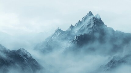 Mountain enveloped in fog creates a serene atmosphere, perfect for capturing the essence of nature. This mountain scene highlights tranquility with ample space for your designs.