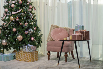 Armchair near Christmas tree, close-up