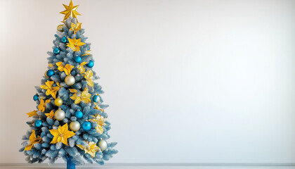 Christmas tree with blue and yellow decorations, white background, copy space, Ukrainian Christmas concept