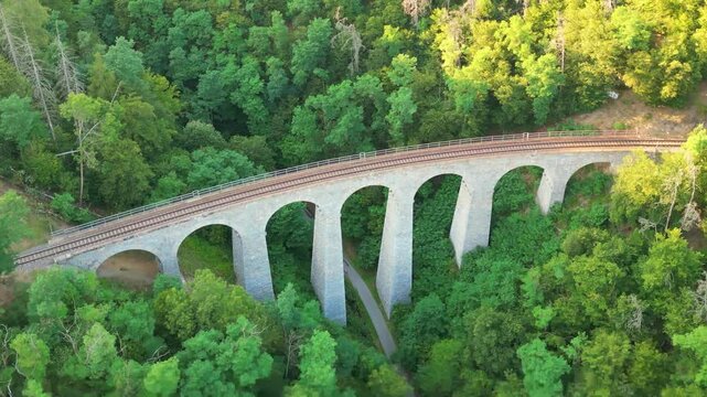Witness the stunning Zampach railway bridge, the highest stone bridge in Czechia.
