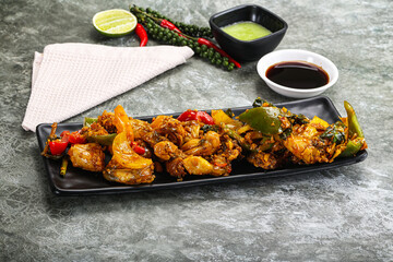 Vietnamese cuisine - fried frog with vegetables