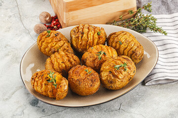 Baked baby potato with thyme