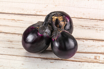 Raw violet and black eggplant