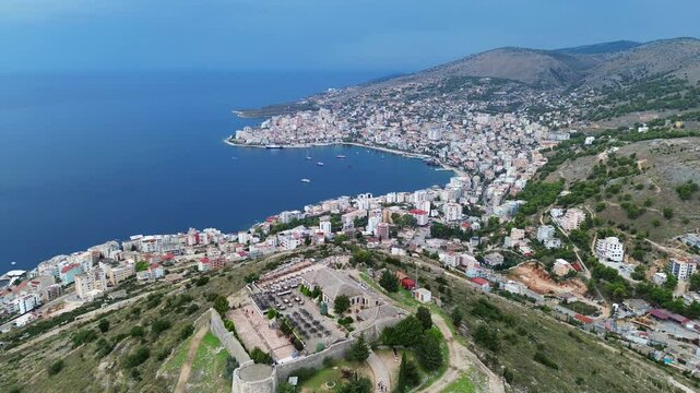 Lekuresi castle ruin Kajala e L&euml;kur&euml;sit Saranda Albania city aerial view
