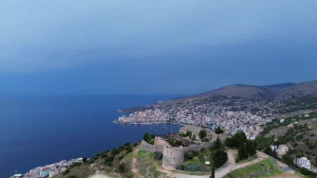 Lekuresi castle ruin Kajala e L&euml;kur&euml;sit Saranda Albania city aerial view