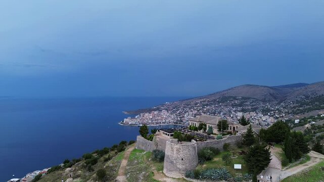 Lekuresi castle ruin Kajala e L&euml;kur&euml;sit Saranda Albania city aerial view