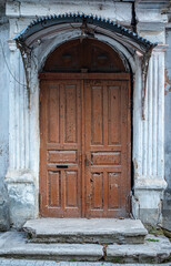 Old vintage wooden door. Entrance doors to houses