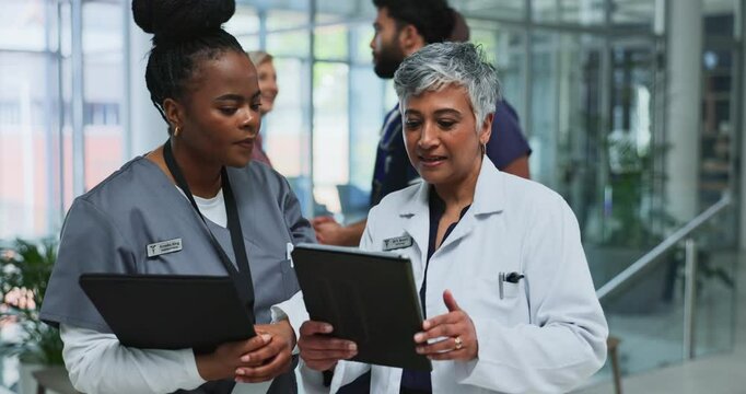 Tablet, team and doctor with nurse for brainstorming, planning and discussion to help intern in hospital. Technology, medical women and collaboration for wellness research, meeting and healthcare