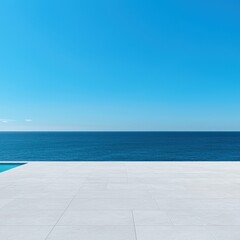 Obraz premium Serene Coastal View with Clear Blue Sky and Ocean