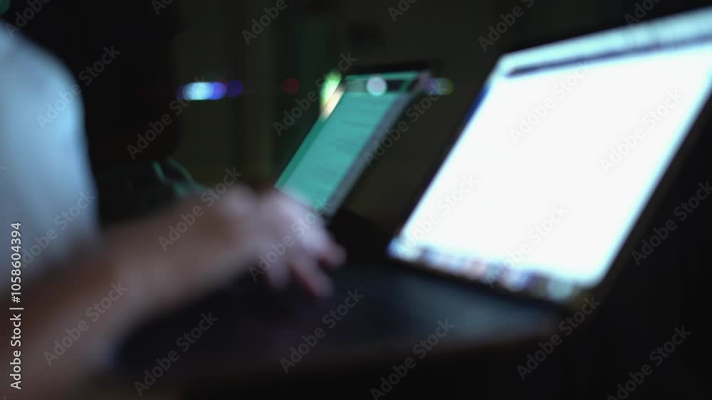 Poster This closeup image captures hands typing on laptops in a dark setting, emphasizing the atmosphere of business and communication in a digital environment optimized for creativity and productivity