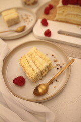 Piece of vanilla cake with raspberries