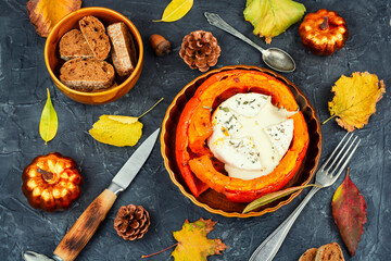 Pumpkin stuffed filled with camembert cheese.