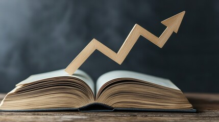 An open book with a wooden upward arrow symbolizing growth and knowledge in business or personal development.